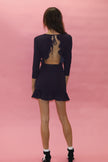 Freedom Ruffle Dress

Featuring an open-back tie detailing and 3/4
