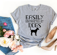 Thumbnail for Easily Distracted By Dogs T-shirtProduct description:
Make a statement with this Easily Distracted By Dogs T-shirt! It's made of premium quality ring spun cotton for a soft feel and comfortable fit.T-shirtsEXPRESS WOMEN'S FASHIONAgateEasily Distracted